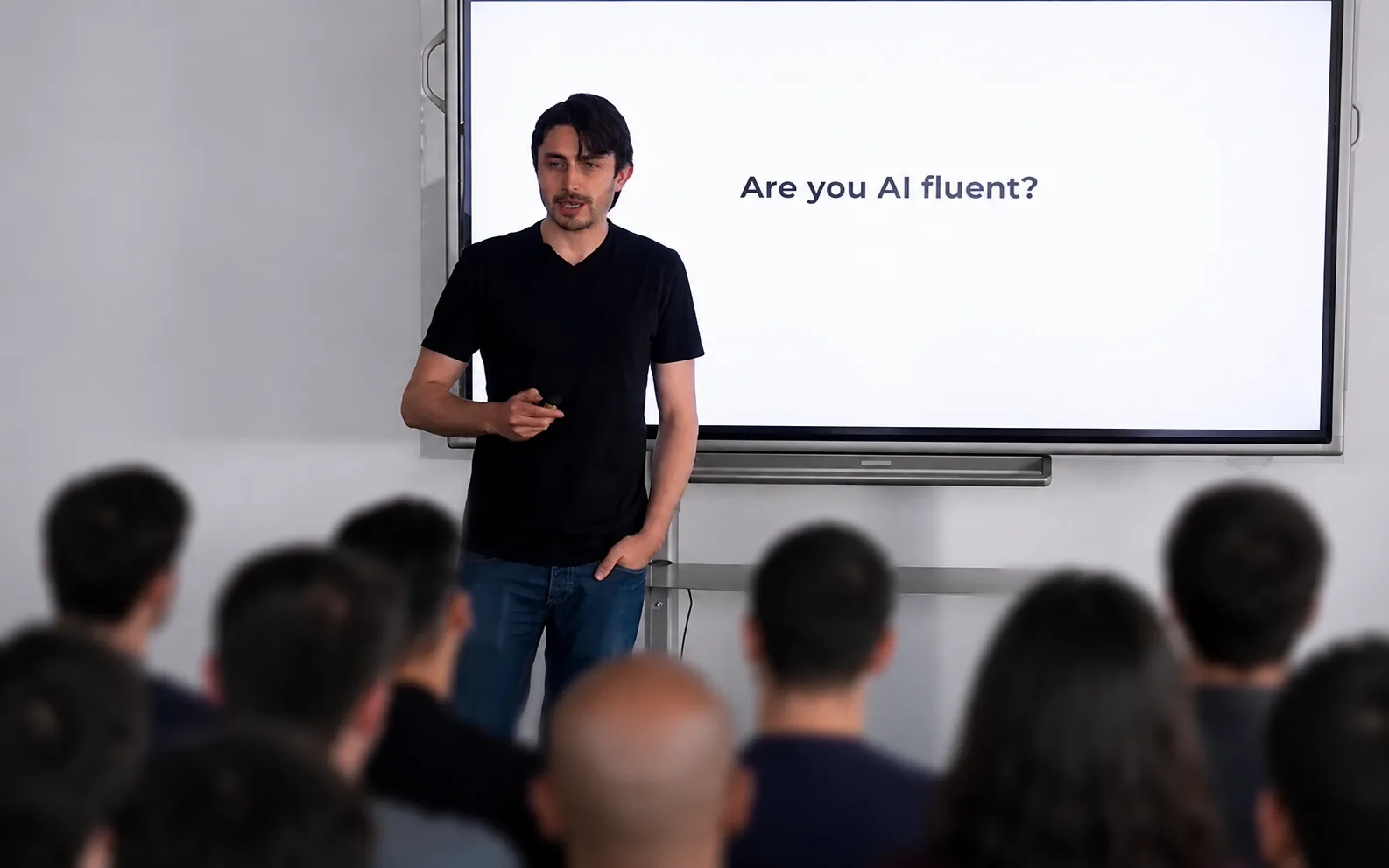 Workshop in progress — slide reads "Are you AI fluent?"